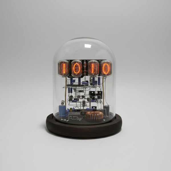 Walnut IN12 nixie tube clock kit styled as retro home office decor with orange vacuum tube glow — Gearfinch