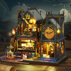 Lighted miniature city house assembled as a compact bookcase scene for fantasy decor