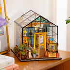 Miniature greenhouse garden shelf display with 389 pieces and detailed pots, plants and garden tools
