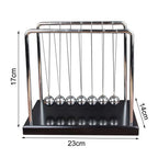 Kinetic Newton's cradle desk display for shoppers comparing motion decor under $50