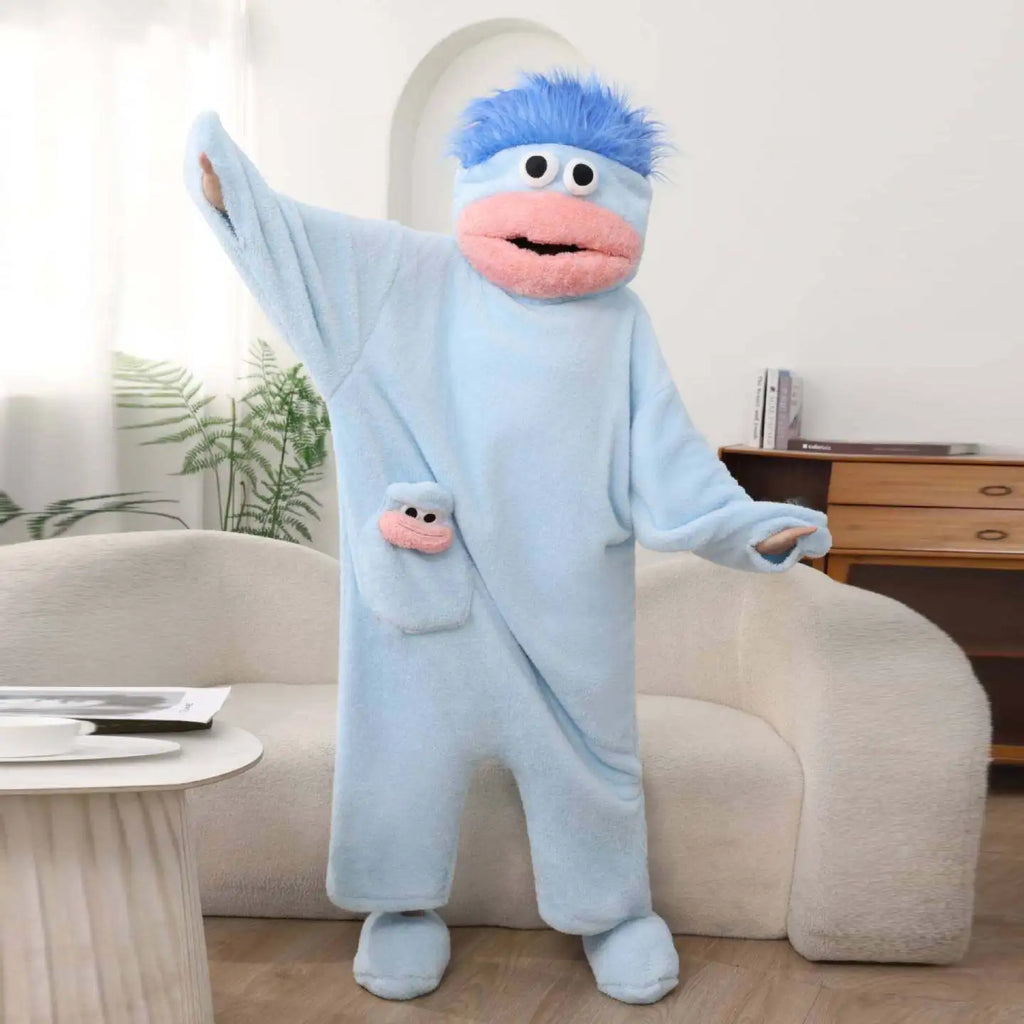 Combinaison en polaire Monstre bleu avec capuche expressive et poche assortie