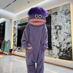 Combinaison en polaire Monstre violet avec capuche expressive et poche assortie