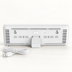 White F900 clock rear, folding stand, mounting slots and attached USB-A cable