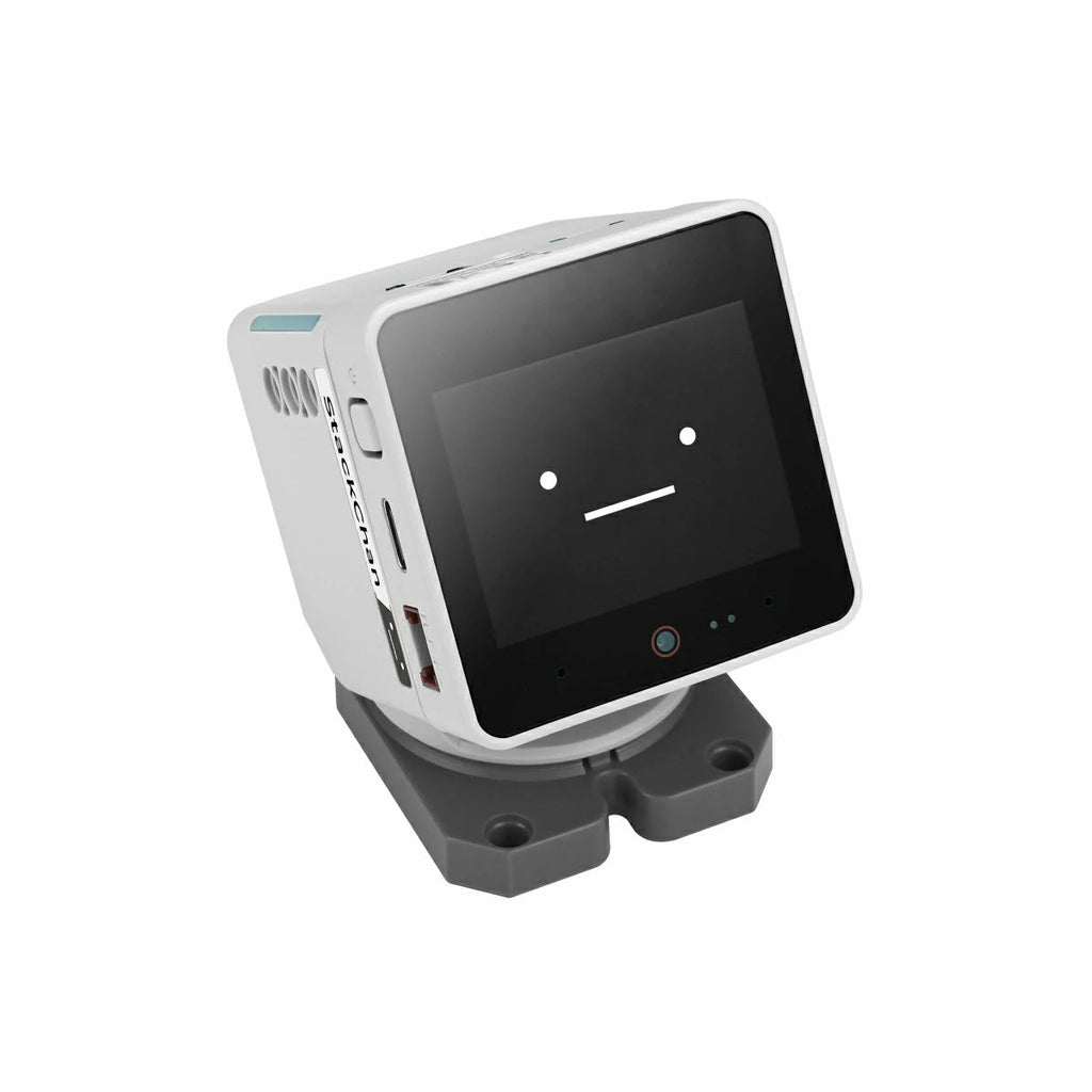 Tilting robot head and compact base