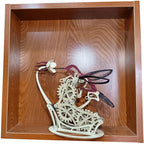 Kinetic wooden hummingbird puzzle kit measuring 29 by 22.8 by 24 cm when assembled