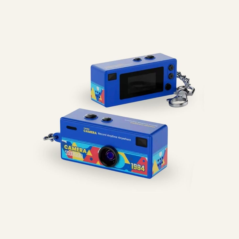 Blue G6 keychain digital camera shown from the front and rear