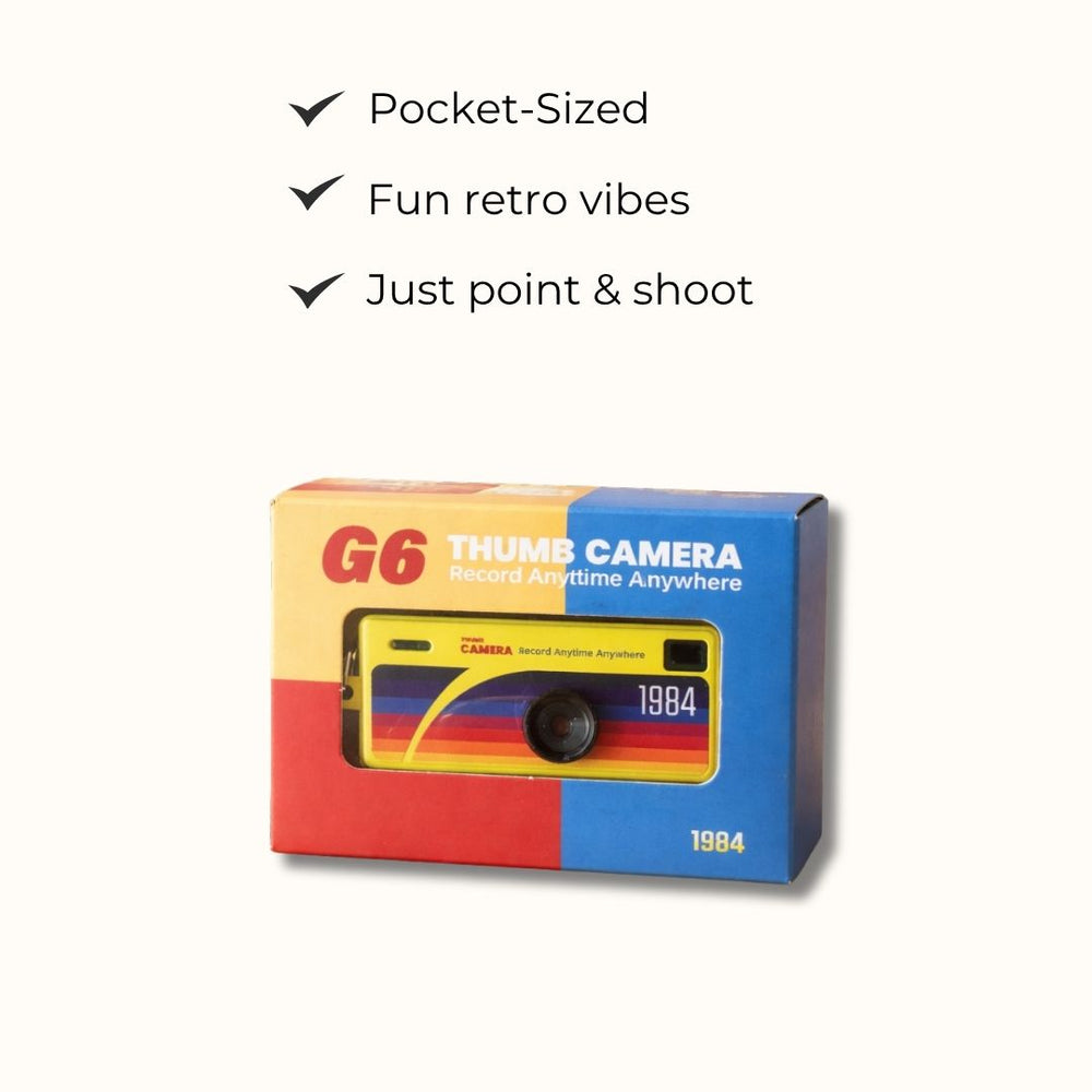 G6 mini keychain camera in its colorful product box