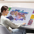 Grey felt-covered puzzle board with 6 drawers for arranging loose pieces during a 2000-piece jigsaw