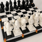 Close view of the sculptural white chess pieces and brick-built board