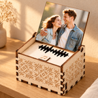 Personalized Photo & Voice Music Box in a styled display; decorative surroundings not included