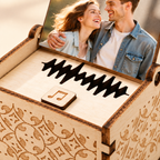 Photo lid, music-note playback button and wooden cutwork detail