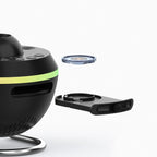PRO planetariumprojector met de dialade open en een projectieschijf ernaast