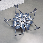 Permanent floral keepsake in mechanical steampunk style, metal sculpture for anniversaries and milestones