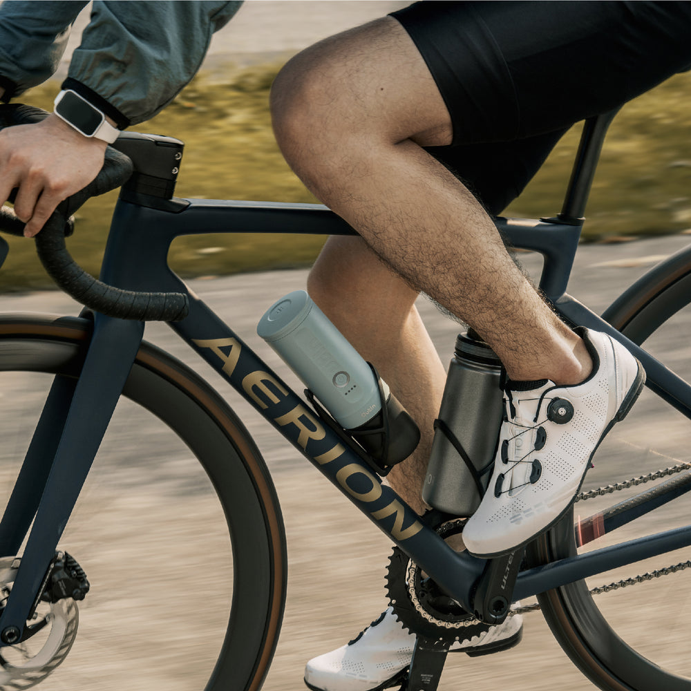 Canyon Green OutIn Nano 2 carried in a bicycle bottle cage