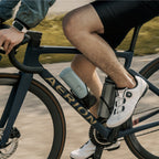 Canyon Green OutIn Nano 2 carried in a bicycle bottle cage