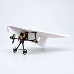 DIY folded paper-airplane example with the motor kit attached; paper not included