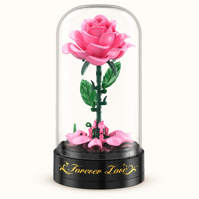 Pink rose building set under its clear dome on the black Forever Love music box base — Gearfinch