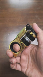 Gold finish demonstration: roller, finger ring and folding mechanism