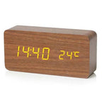 NatureSense alarm clock for a desk, showing time, date and temperature on its illuminated wooden display