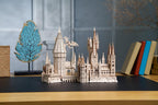 Cutaway Hogwarts castle model revealing detailed interiors in a 3D wooden puzzle kit for ages 14 and up