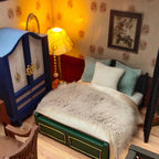Illuminated building pavilion dollhouse kit with warm LED lights and integrated music box