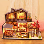 Japanese-style forest habitat miniature with sliding doors, lattice details and a furnished upper bedroom