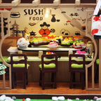Beginner miniature restaurant kit with colored English instructions for a hands-on project