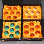 Orange, red, blue, and orange seven-ball sets shown together