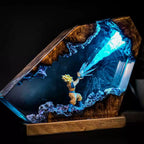 Prism Style Goku light lamp for a gaming desk, with clear resin scene and natural wood base