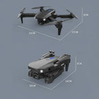 Portable E88 Pro 4K camera drone with replacement propeller blades for travel