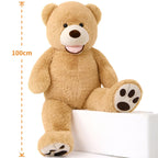 Oversized teddy bear for Christmas, a soft stuffed gift offered in sizes from 36 inches to six feet