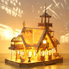 Illuminated wooden castle model kit with multiple levels, balconies and decorative towers