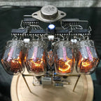 Pine and Walnut IN12 nixie tube clock kit detail showing orange digits and exposed circuitry