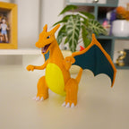 Charizard dragon figure with a flashing LED tail light for imaginative play