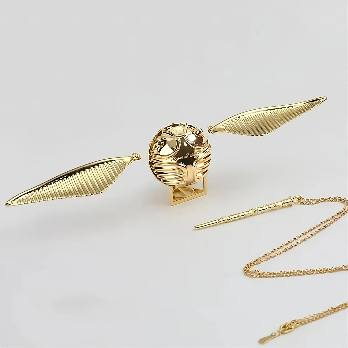 Gold wing Harry Potter proposal ring box, 3.5-inch Golden Snitch design with a velvet ring insert — Gearfinch