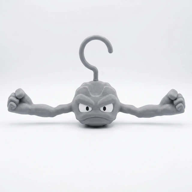 Pokemon Geodude clothes hanger with stone gray finish and outstretched anti-slip arms for hoodies — Gearfinch