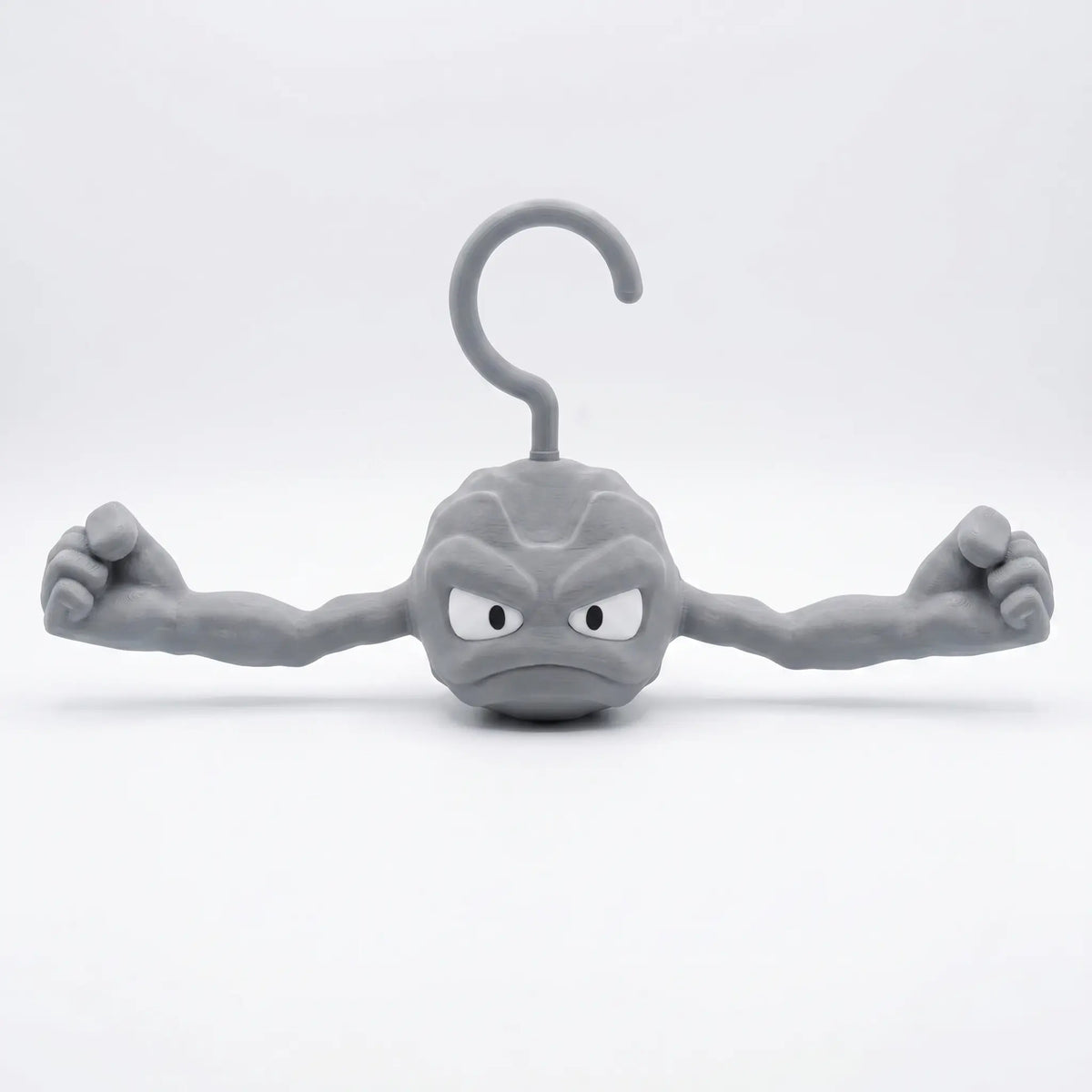Pokemon Geodude clothes hanger with stone gray finish and outstretched anti-slip arms for hoodies — Gearfinch