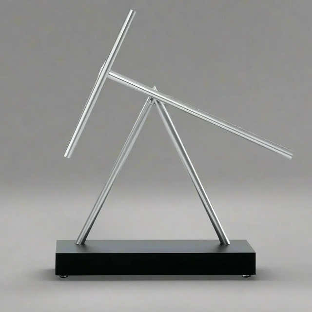 Swinging Sticks kinetic energy sculpture for a moving focal point on an executive desk — Gearfinch