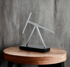 Swinging Sticks moving sculpture for a Christmas gift for him under $100