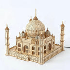 Taj Mahal architecture model with warm LED lights shining through arches and the central dome
