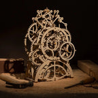 DIY wooden clock kit with exposed gear train and gravity pendulum for mechanical model builders