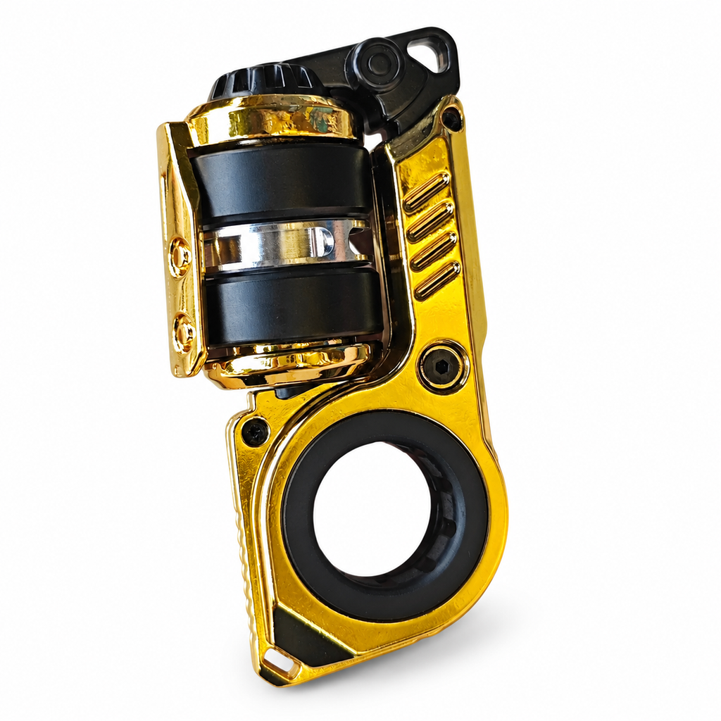 Gold Resonance metal fidget toy with black roller and finger ring on white