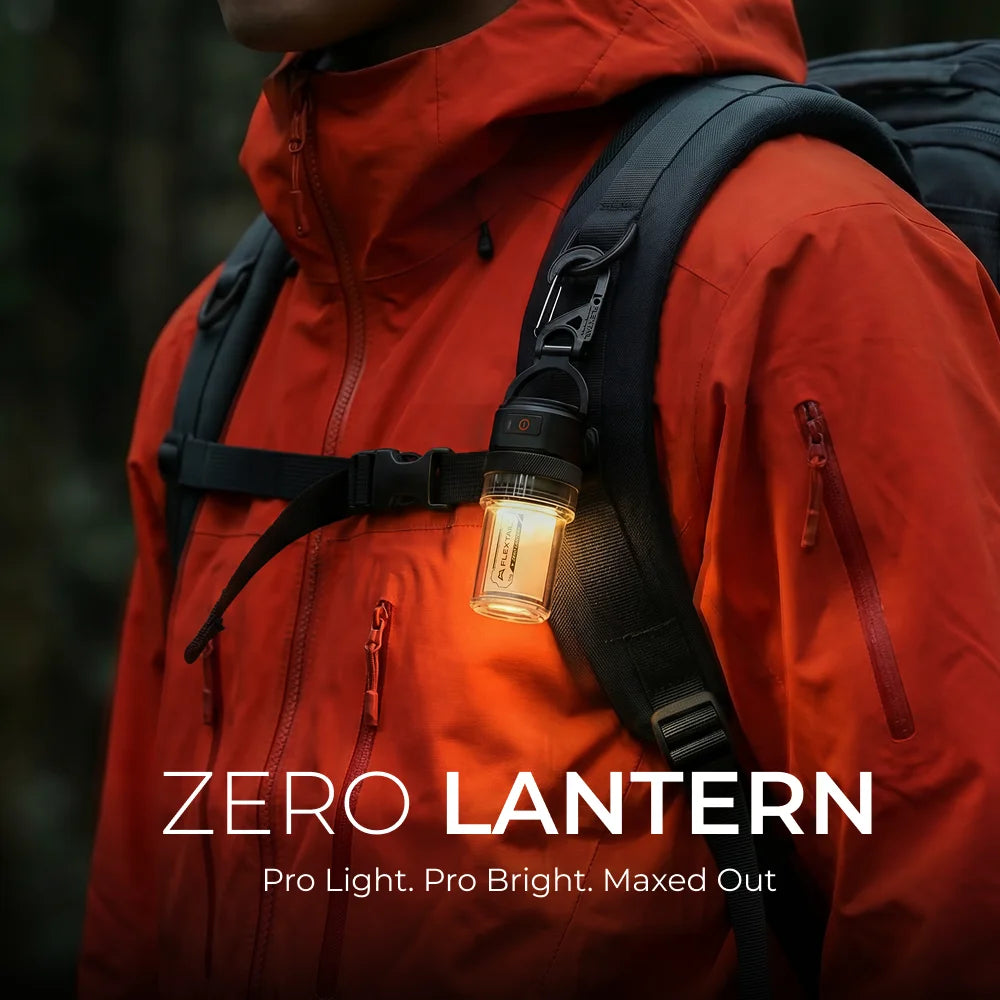 Manufacturer photograph of lantern clipped to a backpack