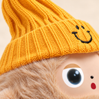 Mustard knit-hat and fur detail