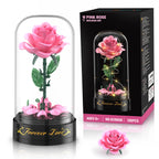 Rosa Rose aus Bausteinen mit transparenter Kuppel, schwarzer Spieluhr und Verpackung für 126 Teile.