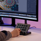 Hand using the D200X during creative work
